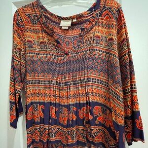 Anthropologie orange and blue patterned top